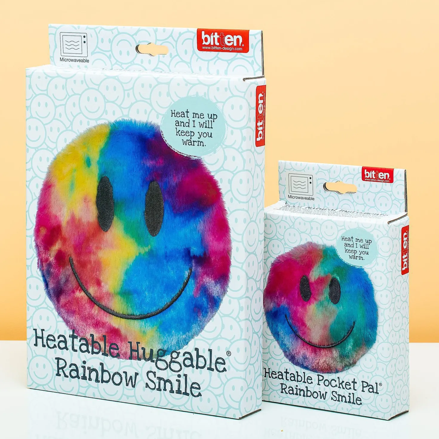 Regenboog smiley warmtekussen